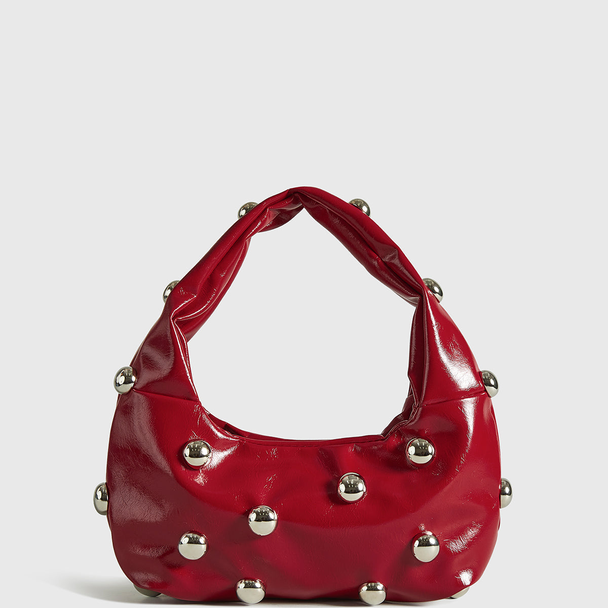 Yuvarlak Formlu Zımbalı Koltuk Altı Çantası