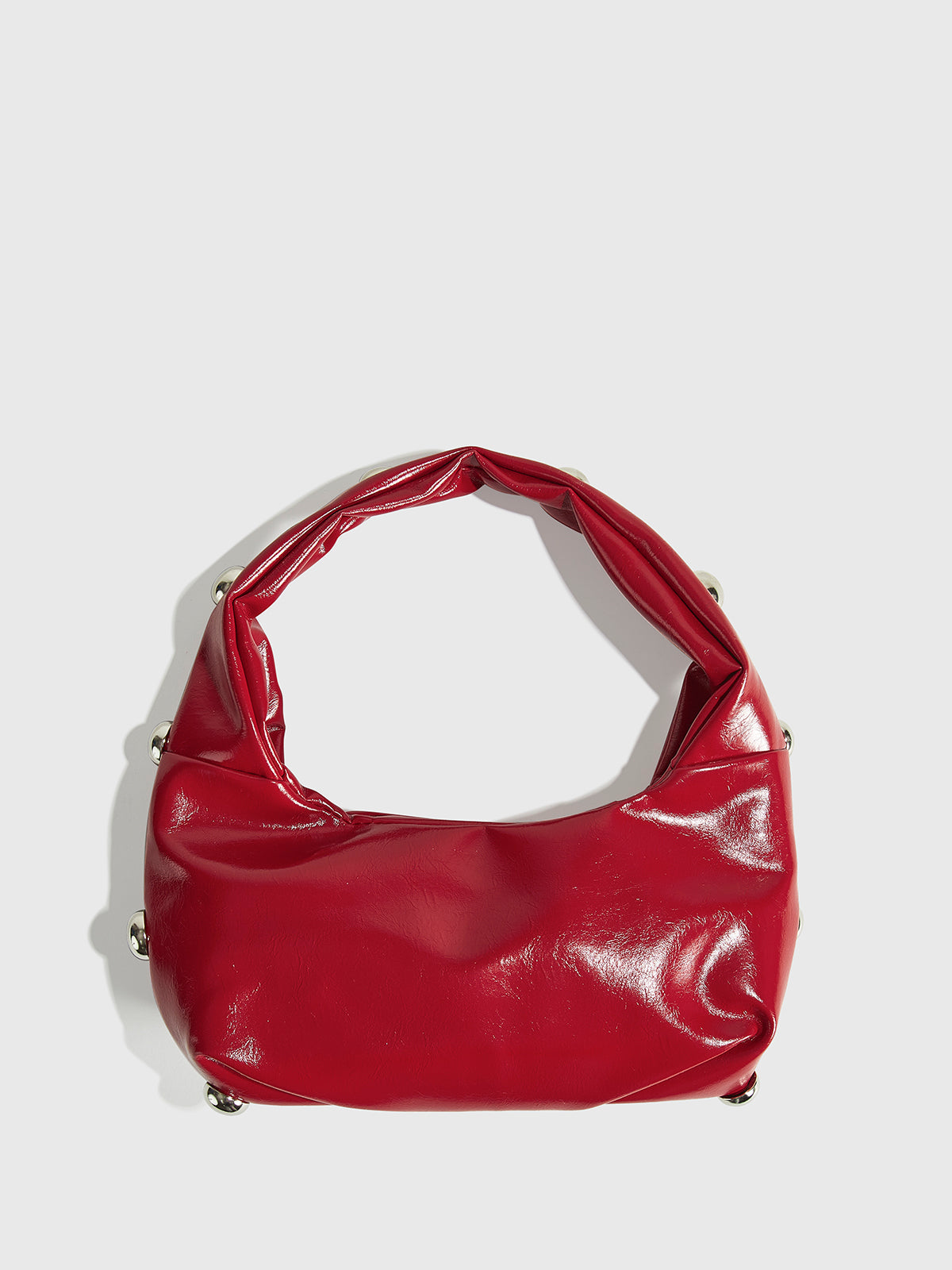 Yuvarlak Formlu Zımbalı Koltuk Altı Çantası