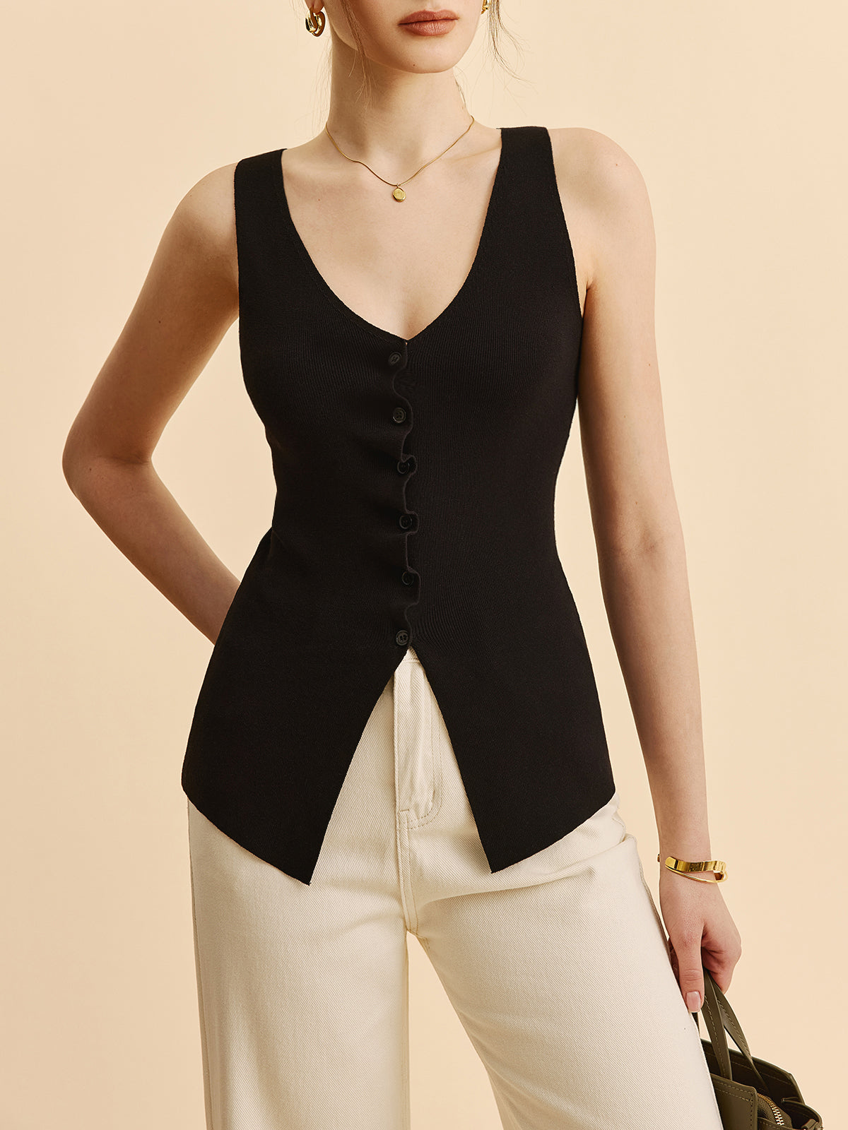 Kıvrımlı Kenar Detaylı Yırtmaçlı Triko Yelek