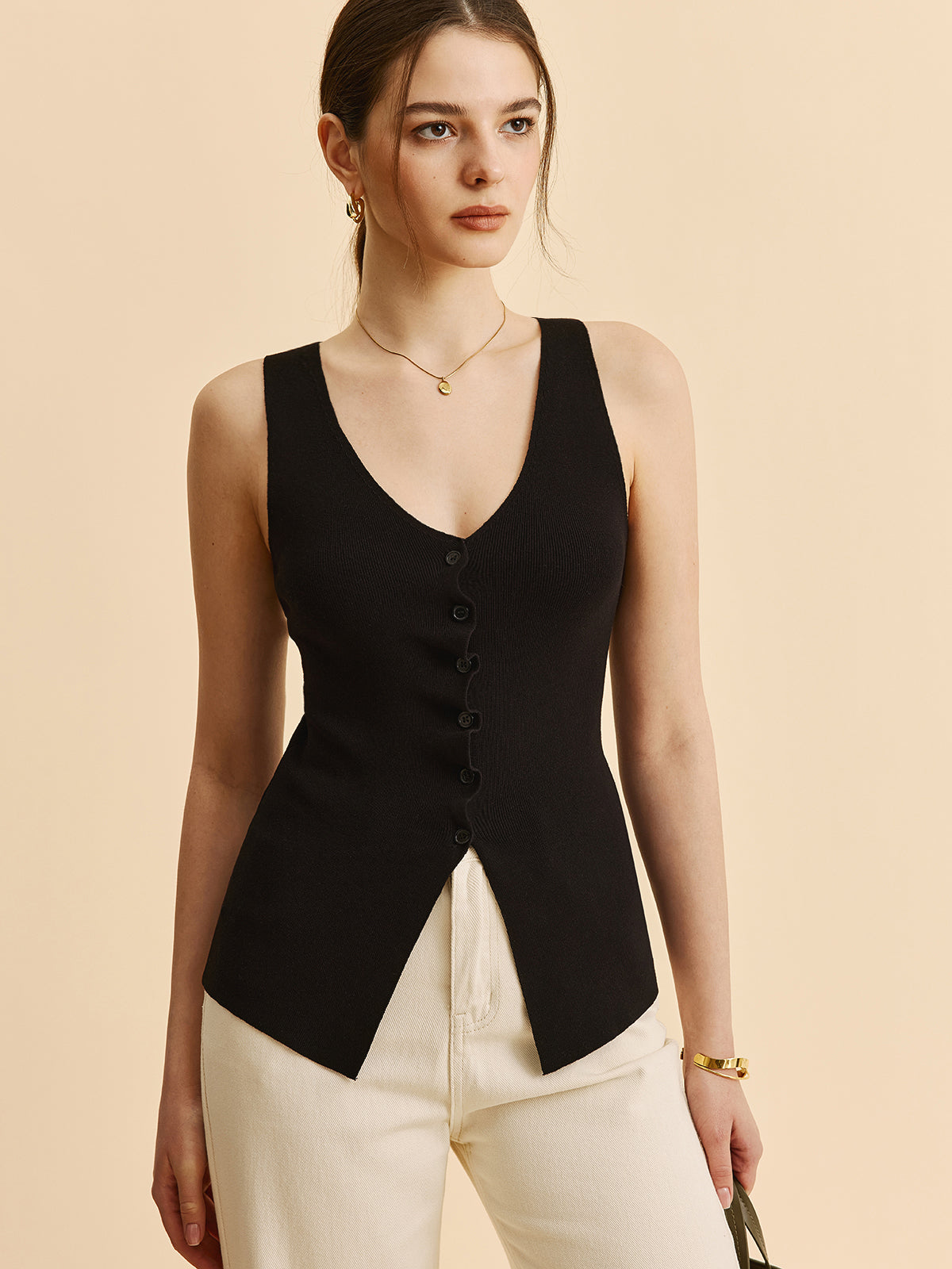 Kıvrımlı Kenar Detaylı Yırtmaçlı Triko Yelek