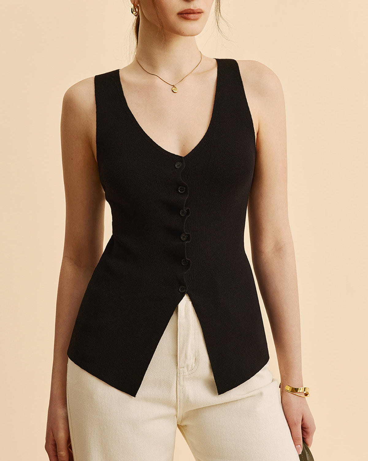 Kıvrımlı Kenar Detaylı Yırtmaçlı Triko Yelek